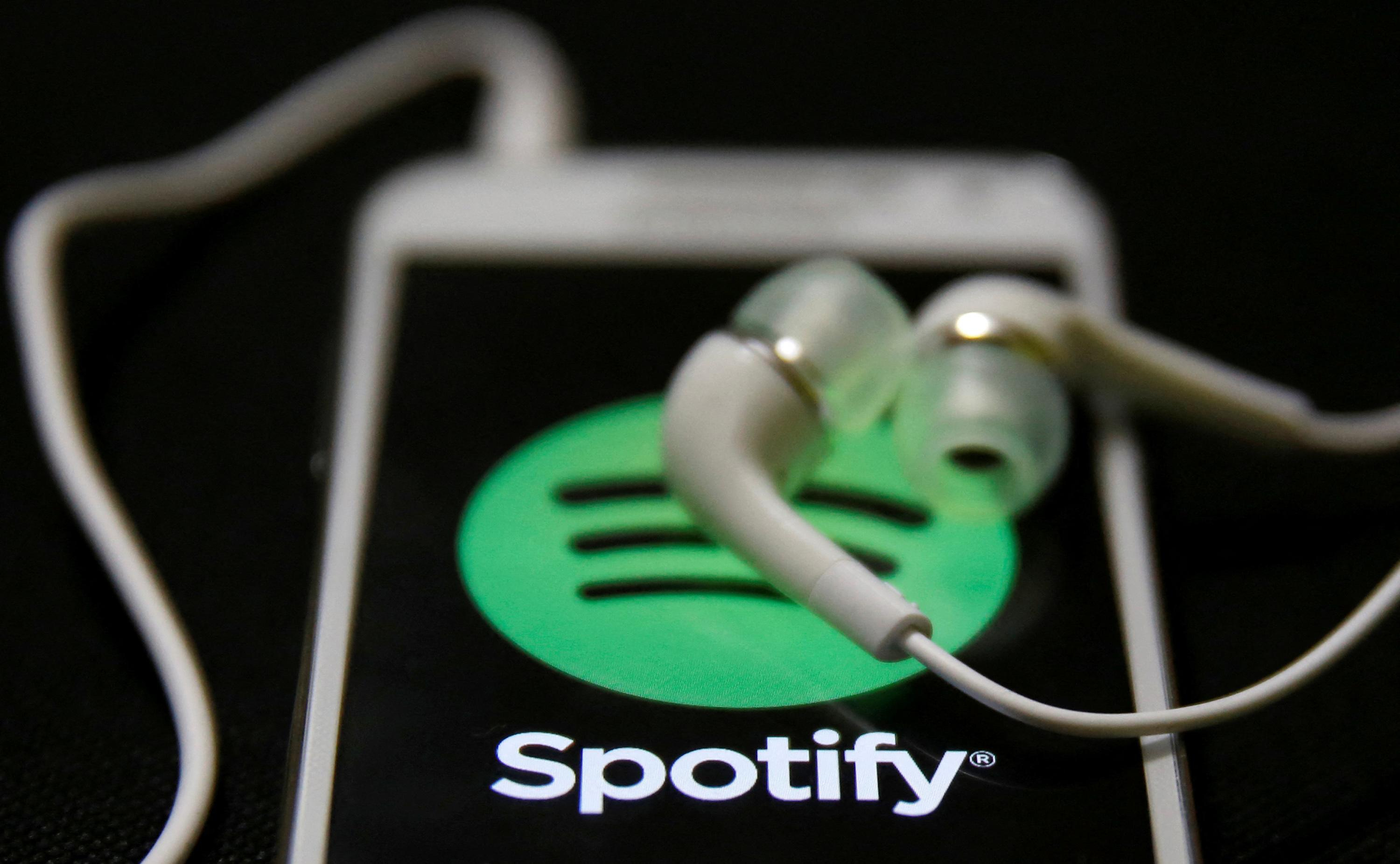 In search of profitability, Spotify cuts one in six jobs